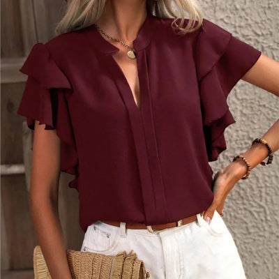 Amira | Elegante Bluse mit verzierten Ärmeln